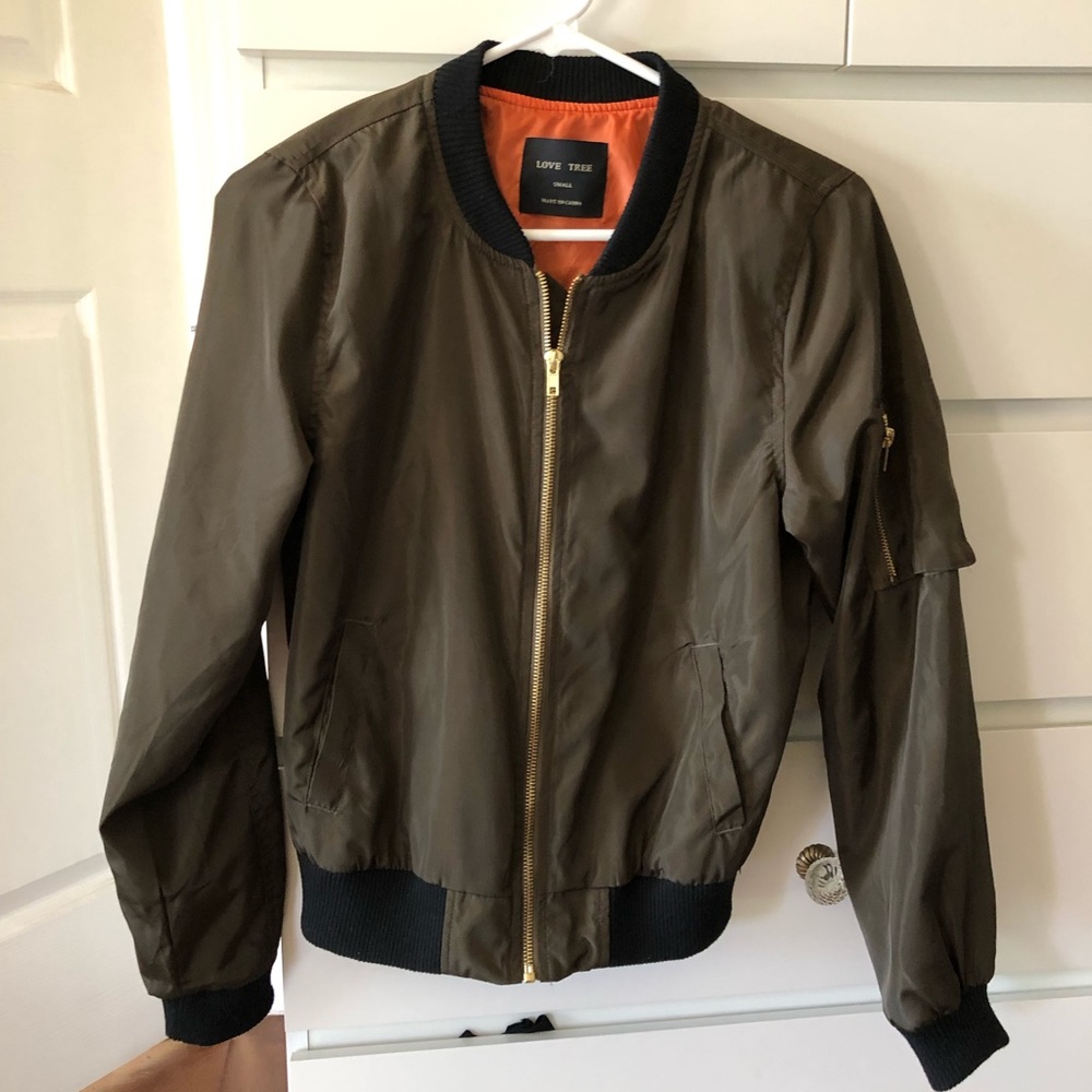 Great condition.  Olive bomber jacket